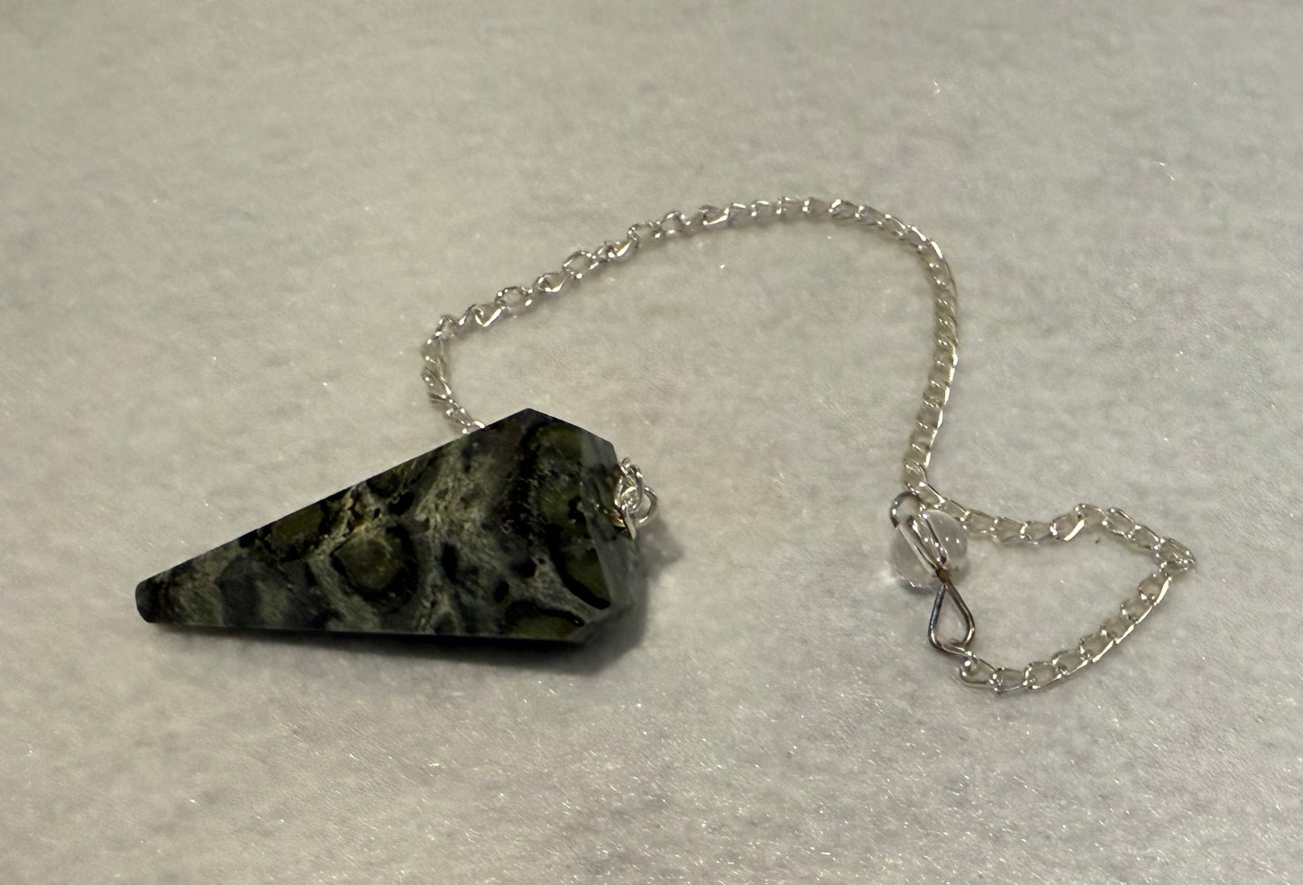 Kambaba Jasper Pendulum is  1.65” and with chain is 9.5”