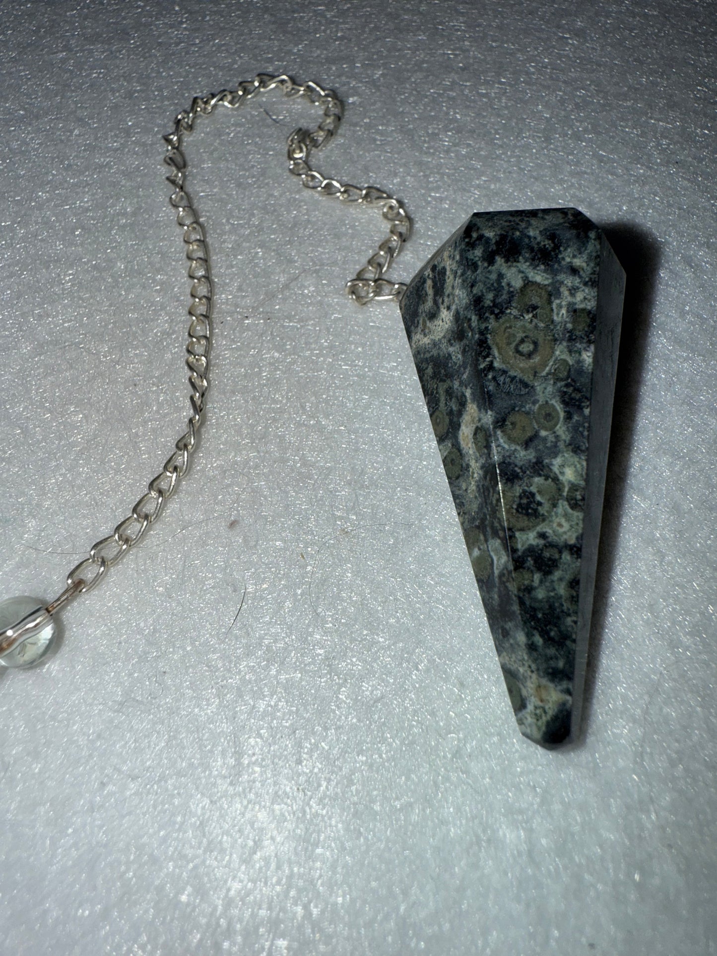 Serpentine Pendulum is  1.75” and with chain is 9.25”