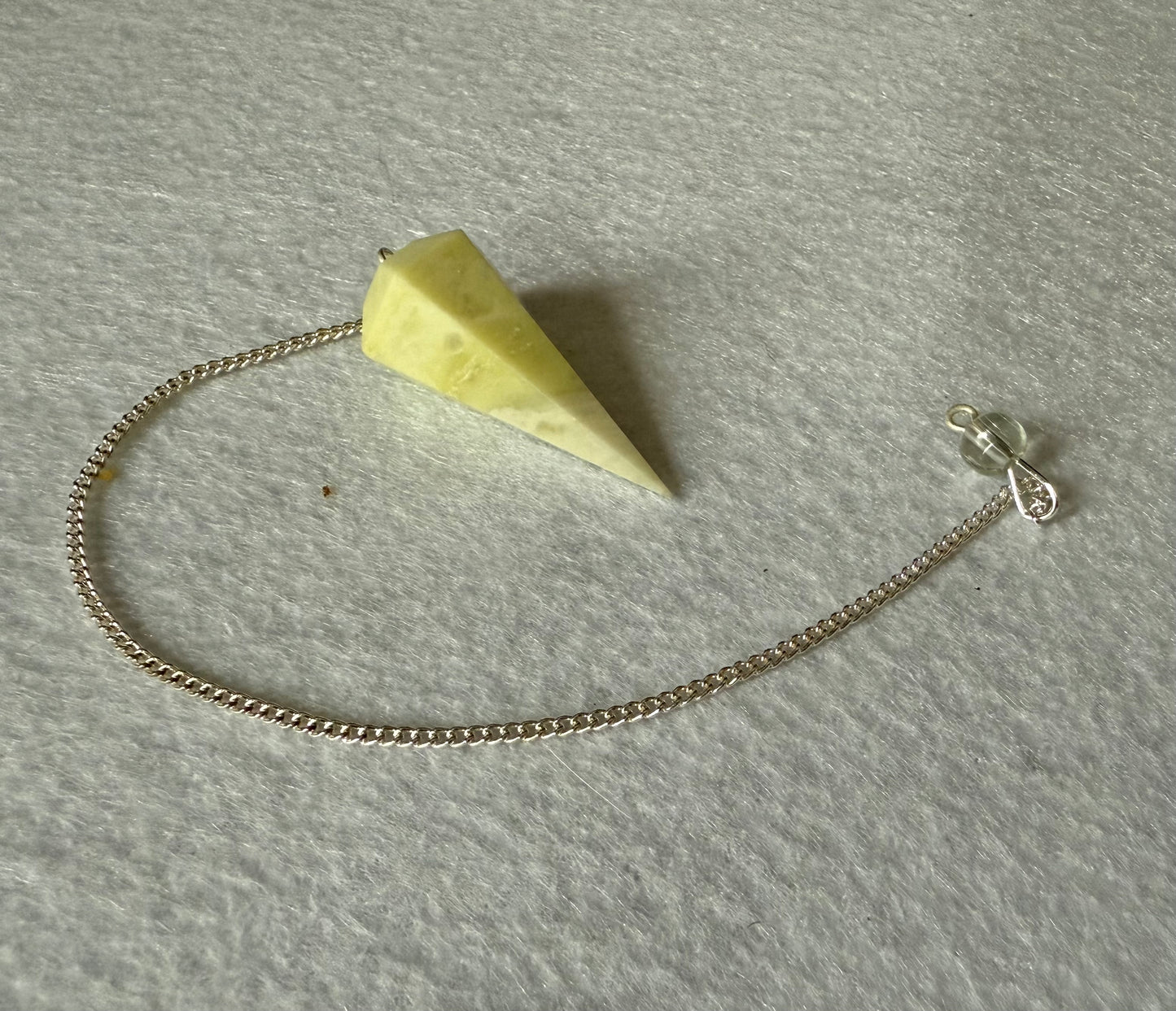 Beautiful Serpentine Pendulum is  1.5” and with chain is 8.75”