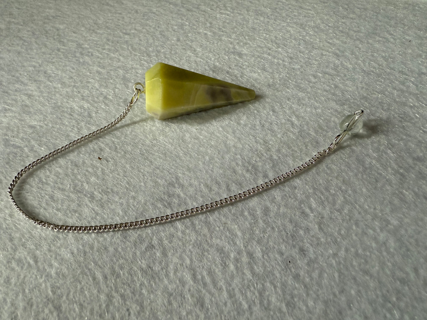Very Unique Serpentine Pendulum is  1.65” and with chain is 9”