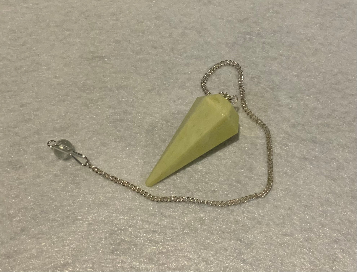 Awesome Serpentine Pendulum is  1.65” and with chain is 9”