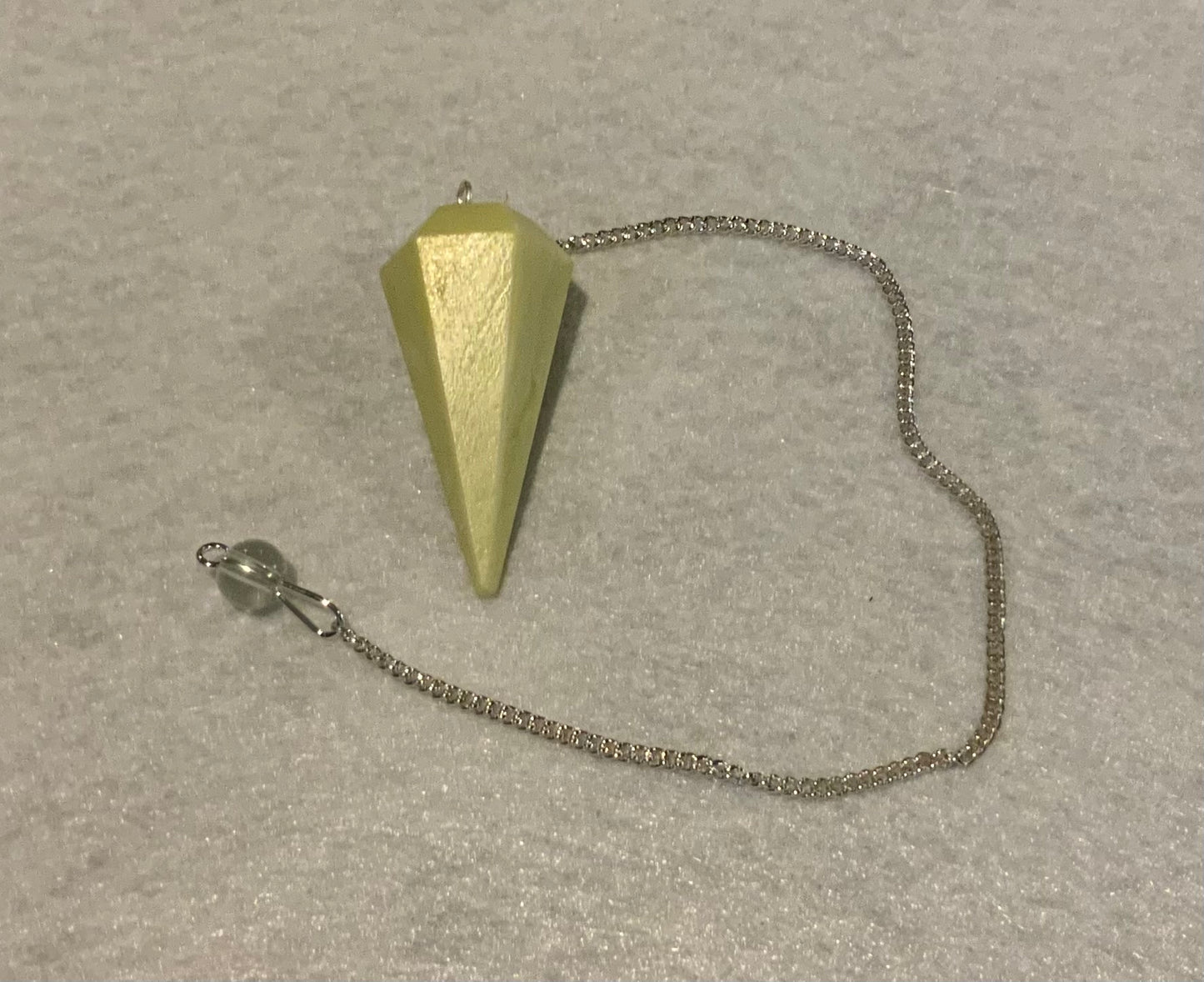 Awesome Serpentine Pendulum is  1.65” and with chain is 9”