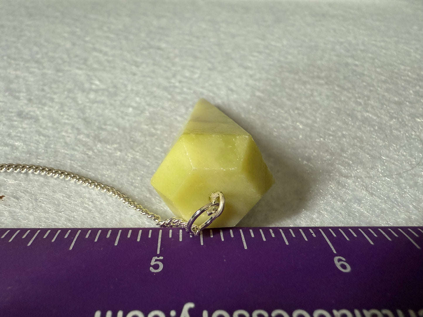 Very Unique Serpentine Pendulum is  1.65” and with chain is 9”
