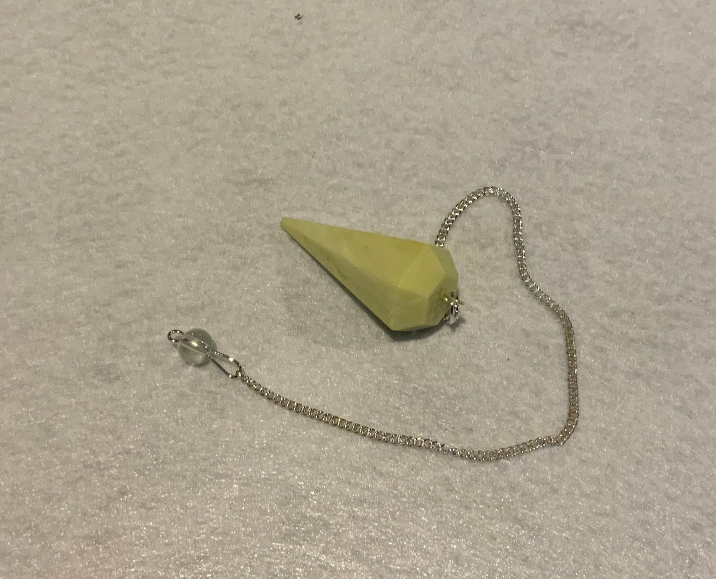 Awesome Serpentine Pendulum is  1.65” and with chain is 9”