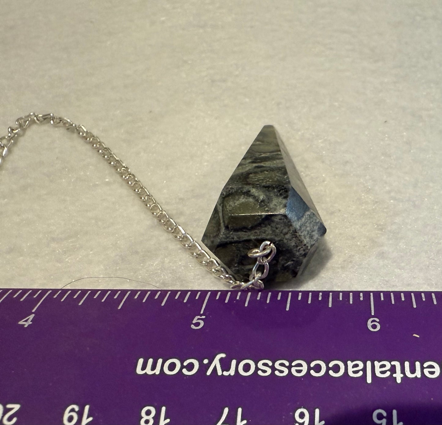 Kambaba Jasper Pendulum is  1.65” and with chain is 9.5”