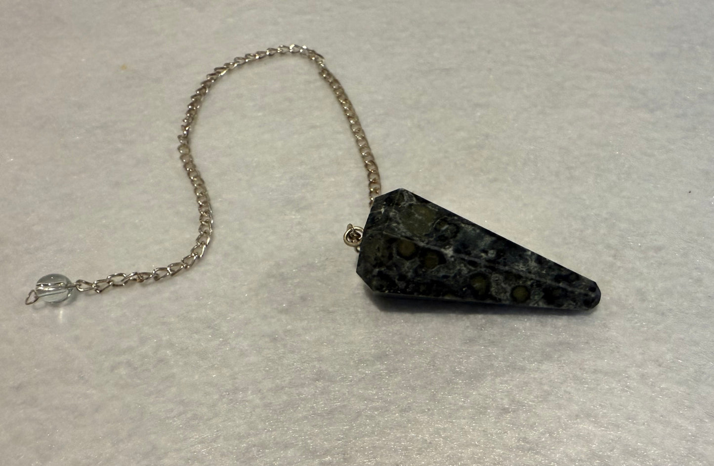 Pretty Kambaba Jasper Pendulum is 1.5” with chain is 9.25”