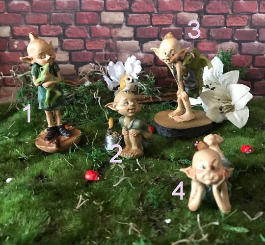 Pixie lovers garden pixie gardening with shovel and bucket