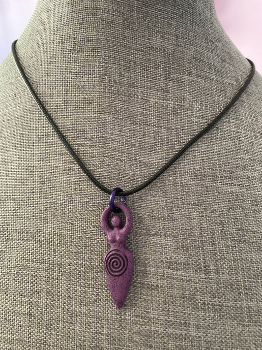 The Goddess pendant necklace on black cord.
