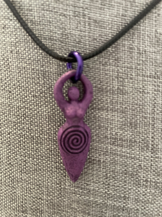 The Goddess pendant necklace on black cord.