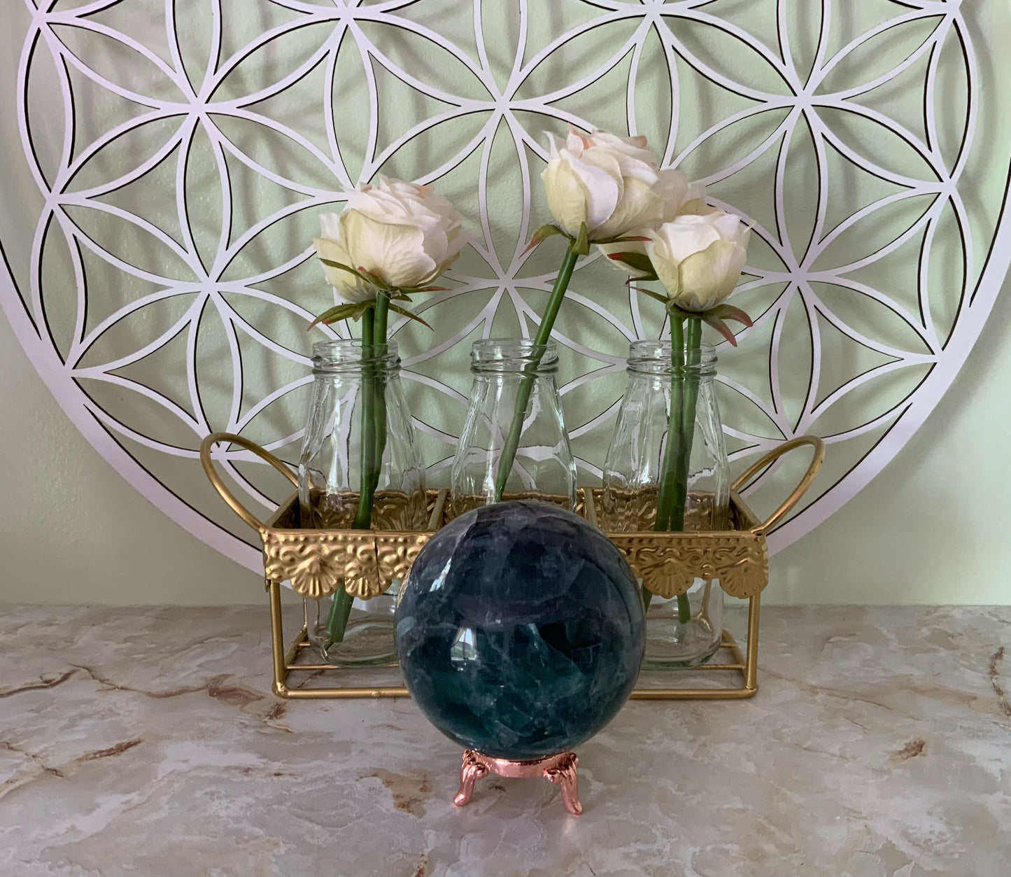 Rainbow Fluorite Sphere weighs over 2 pounds