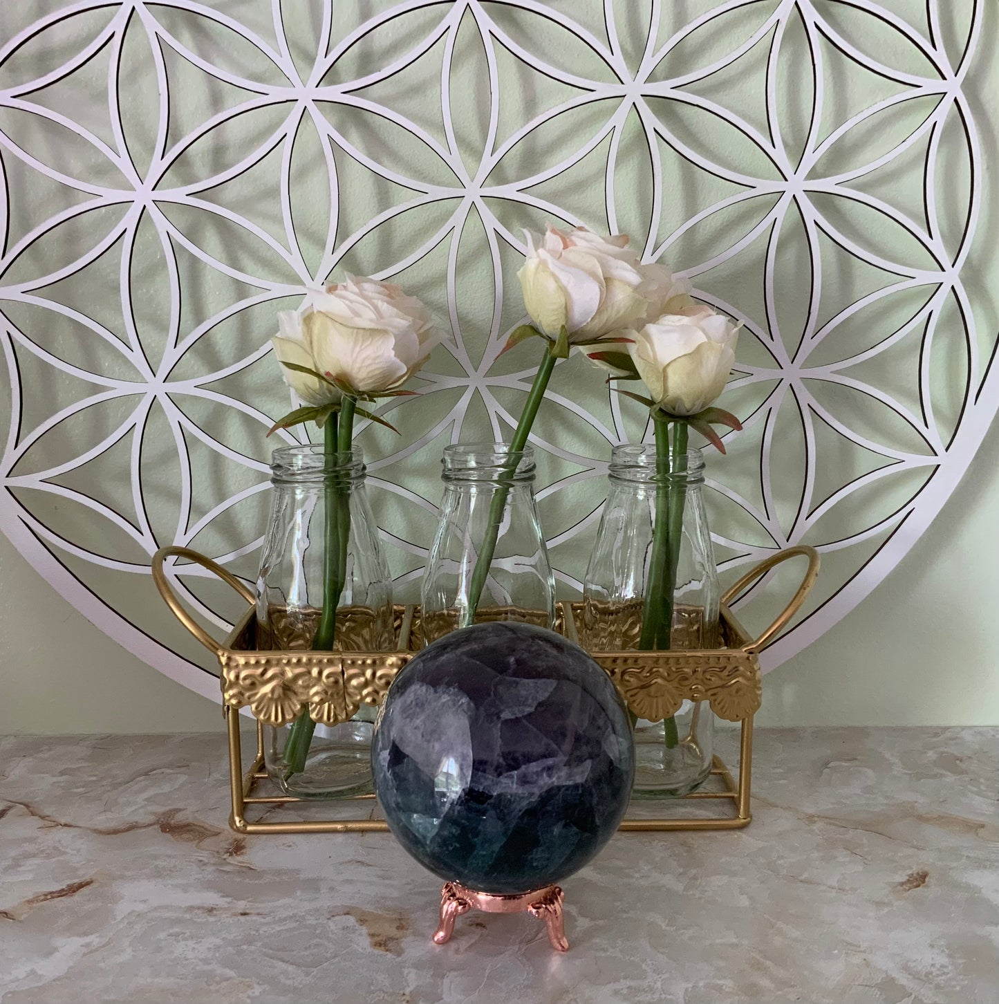 Rainbow Fluorite Sphere weighs over 2 pounds