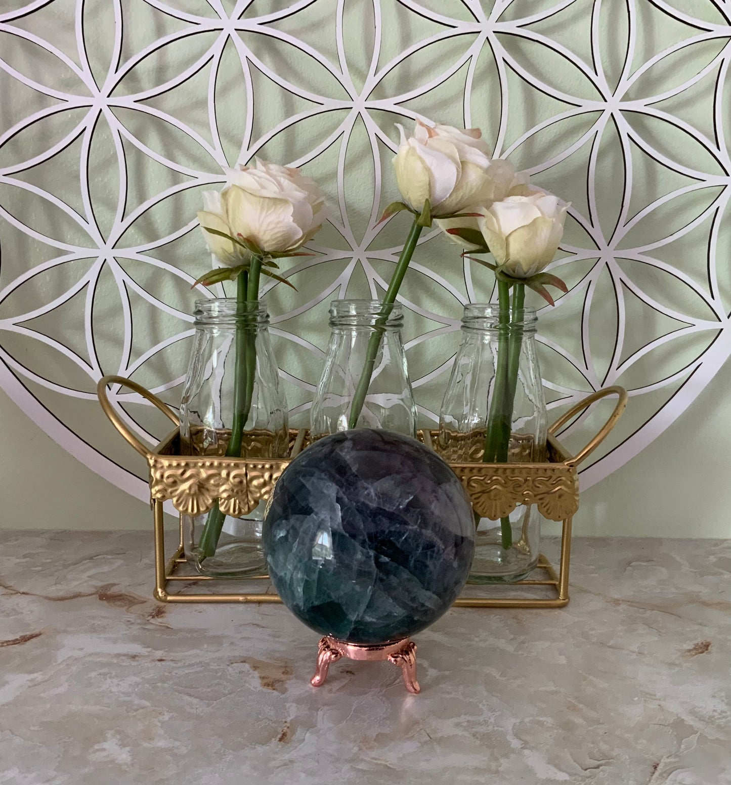 Rainbow Fluorite Sphere weighs over 2 pounds