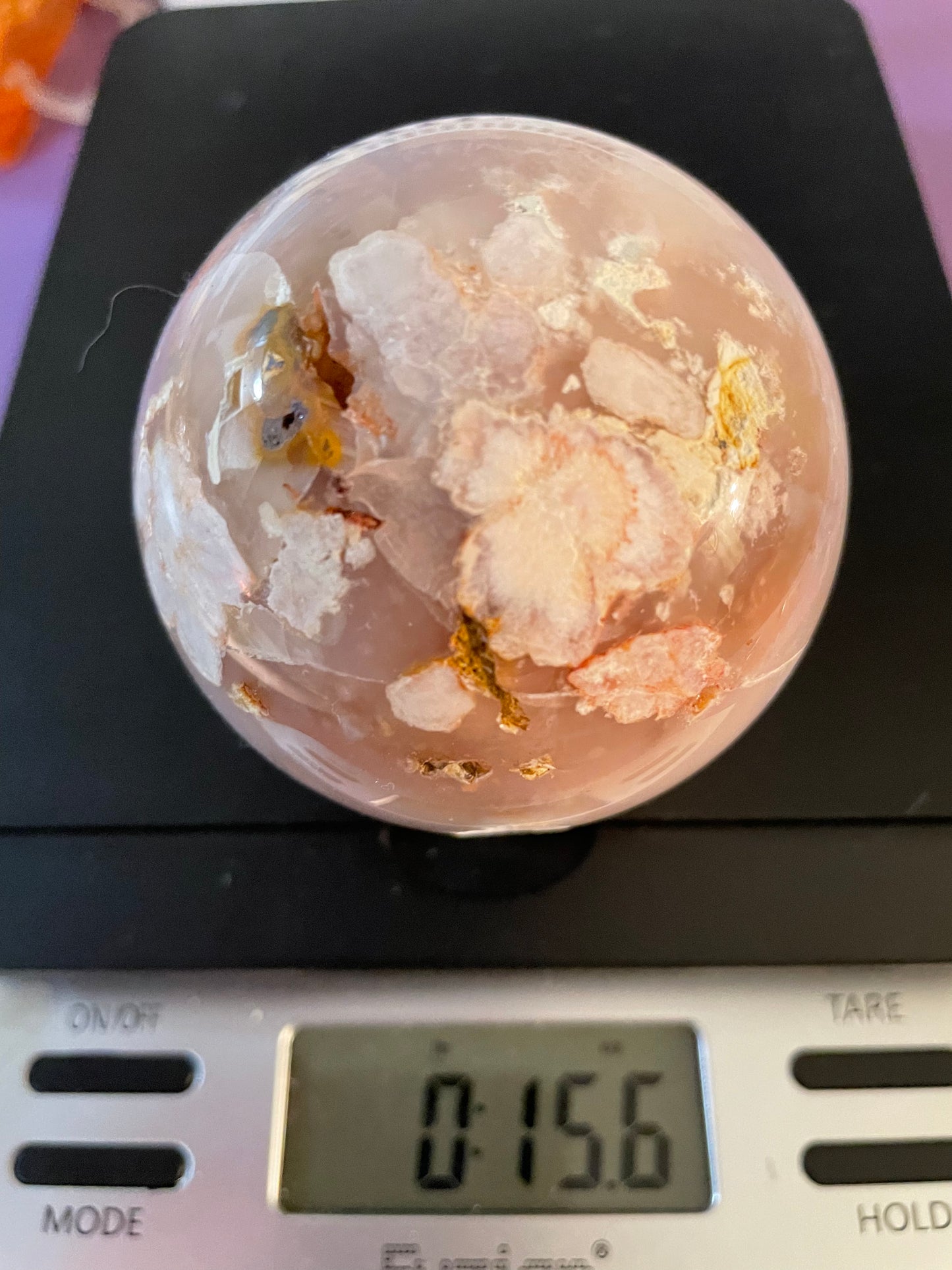 Flower Agate Sphere weighs nearly 1 pound