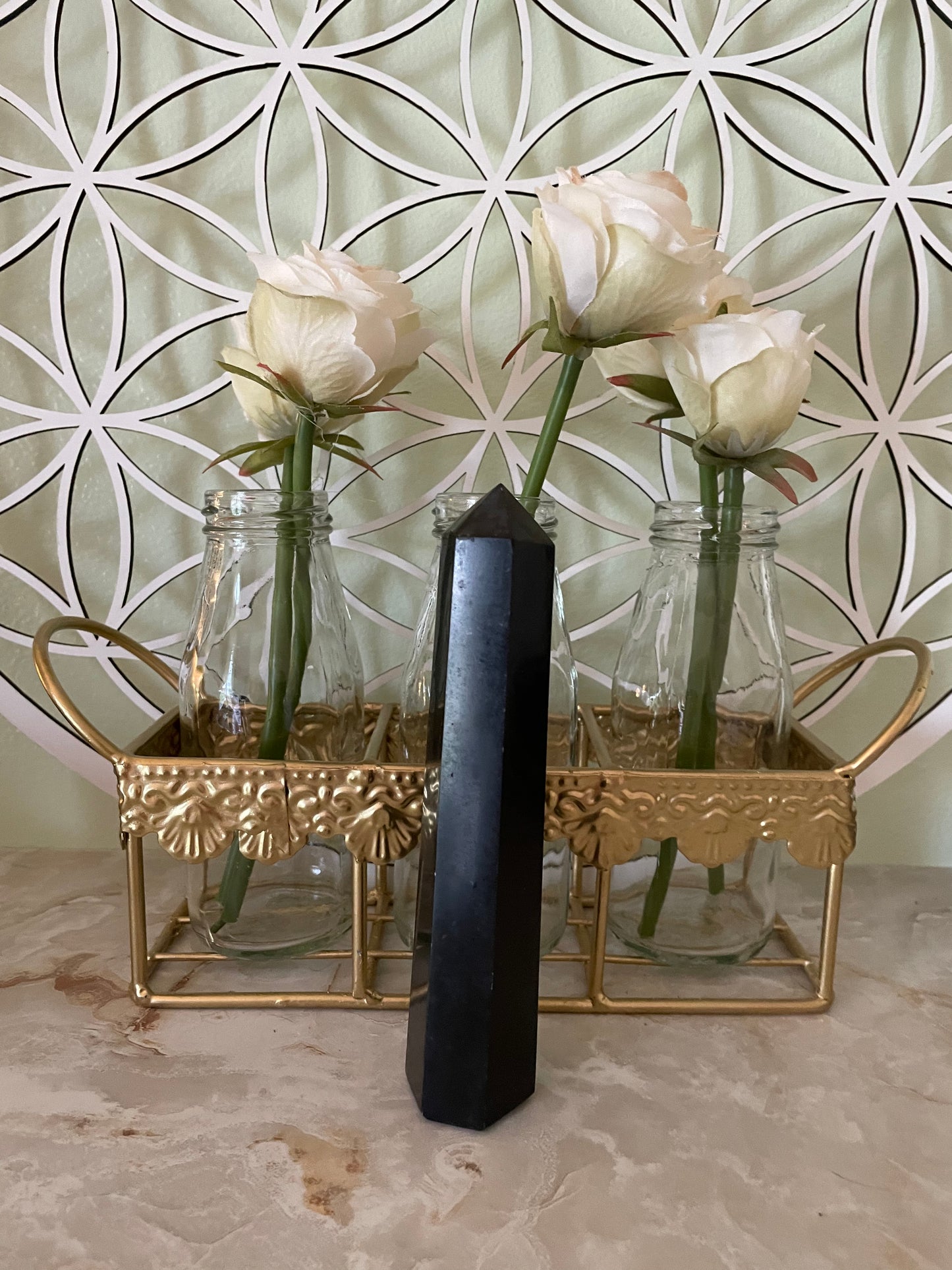 This magnificent Black Tourmaline point is approximately 6” tall and weighs 8.7 ounces.