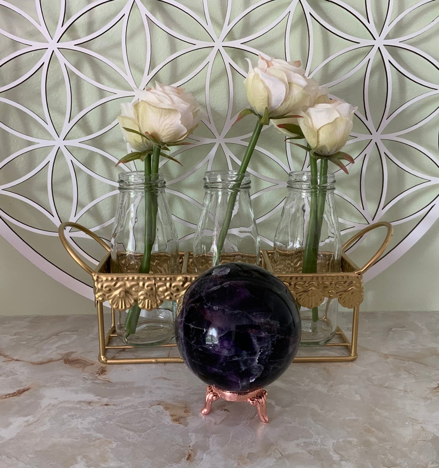 Rainbow Fluorite Sphere weighs over 1 1/2 pounds