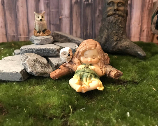 Sweet miniature fairy with cute owl