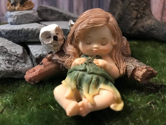 Sweet miniature fairy with cute owl