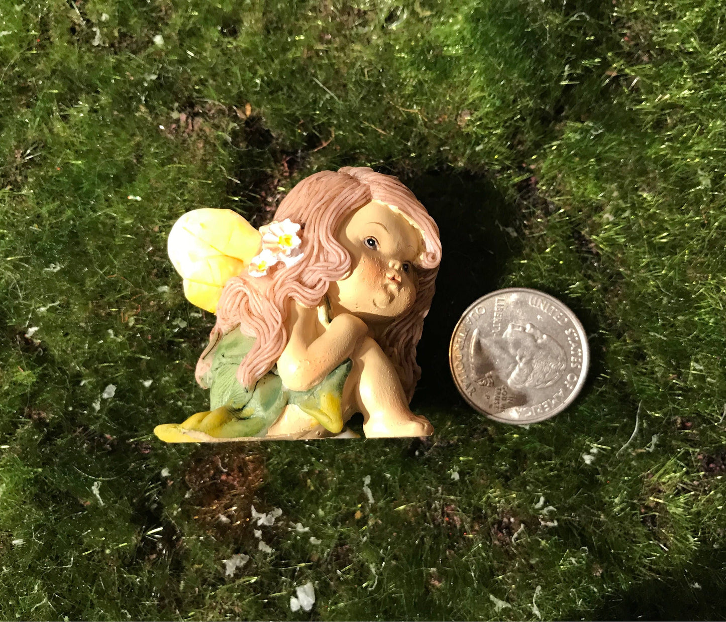 Little fairy with sweet face in deep wonder