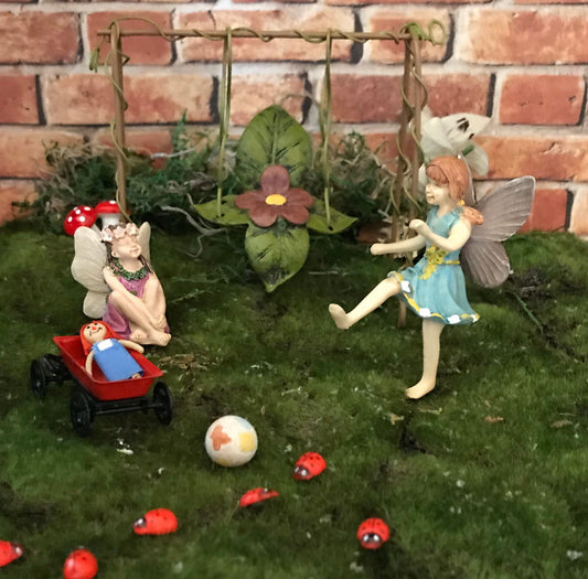 Sweet fairy girl with ball toy