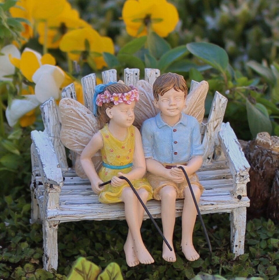 Fairy boy & girl figurine with fishing poles