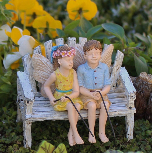 Fairy boy & girl figurine with fishing poles