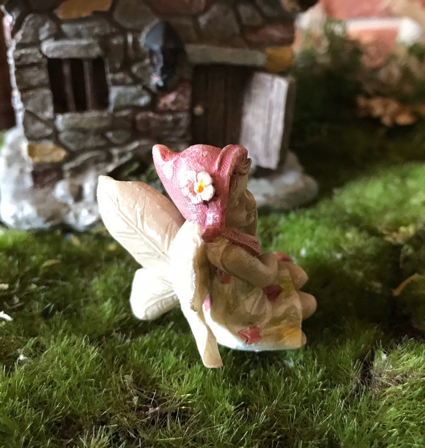 Sweet fairy girl sitting restfully