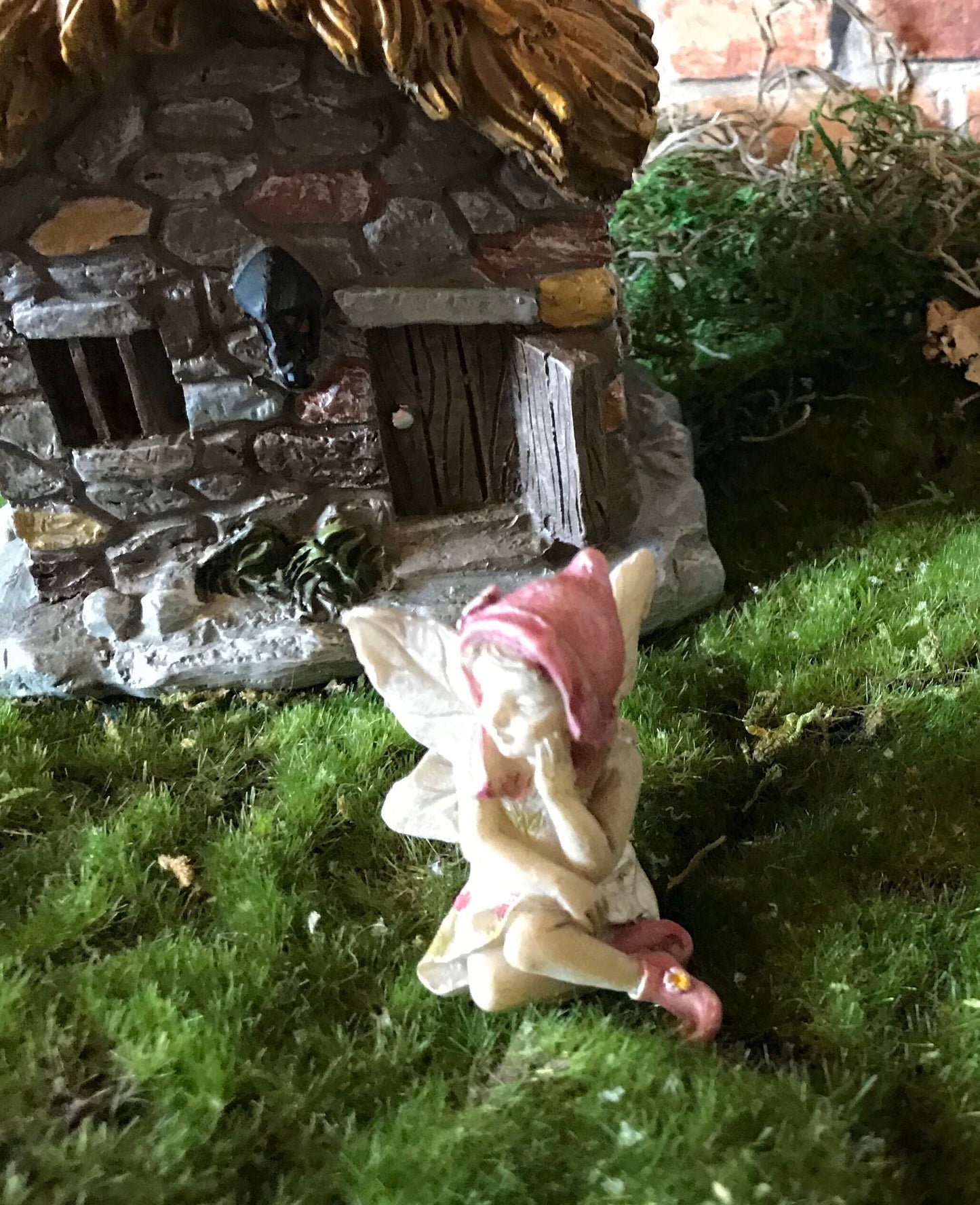 Sweet fairy girl sitting restfully