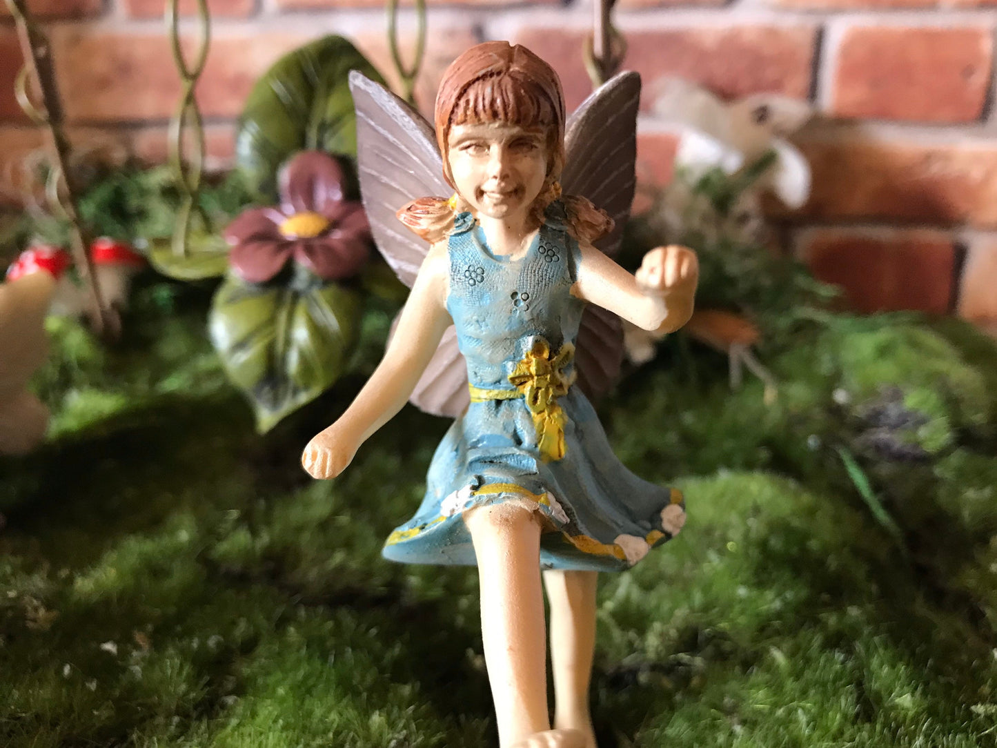 Sweet fairy girl with ball toy