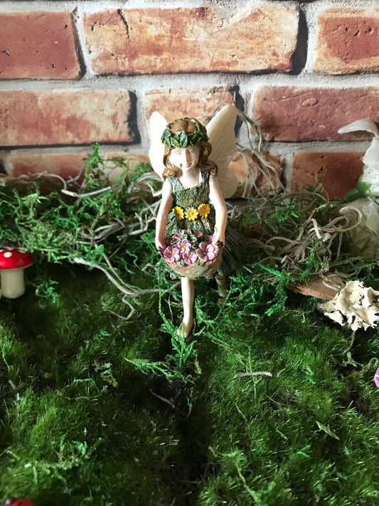 Sweet fairy girl with flowers