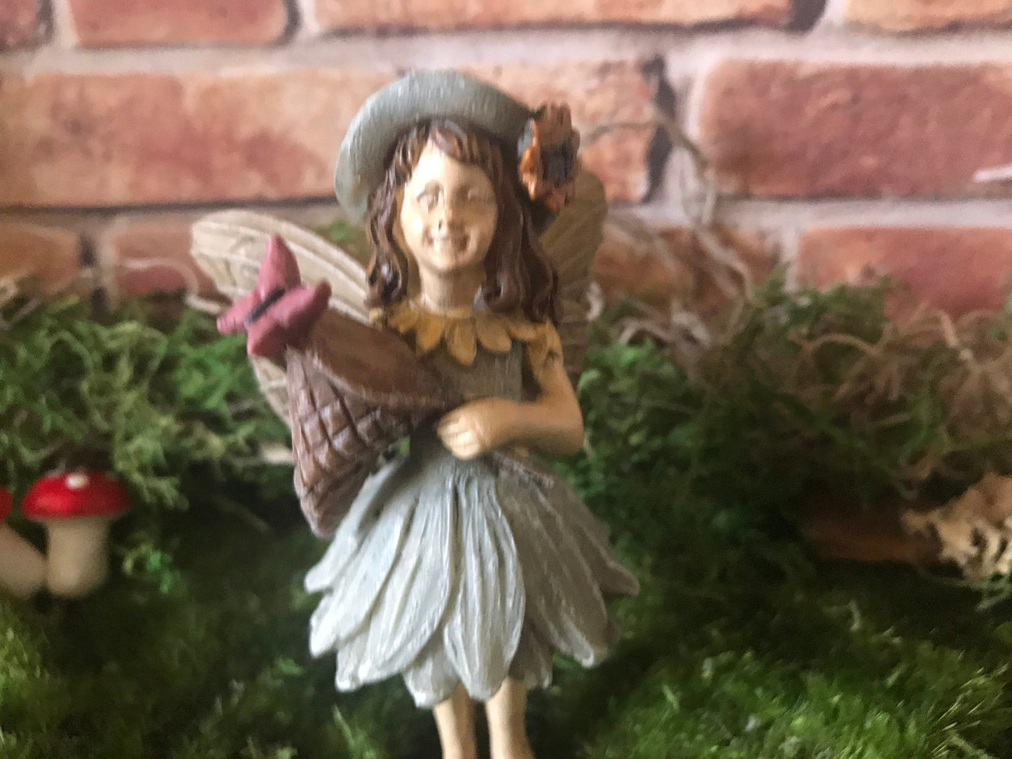 Sweet fairy girl with butterfly and butterfly net