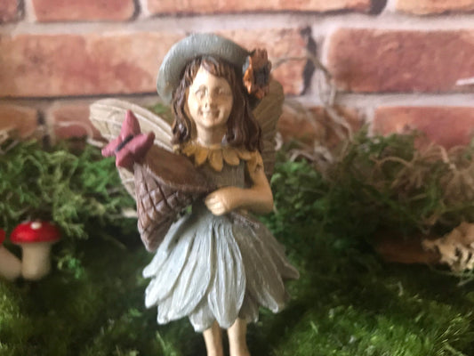 Sweet fairy girl with butterfly and butterfly net