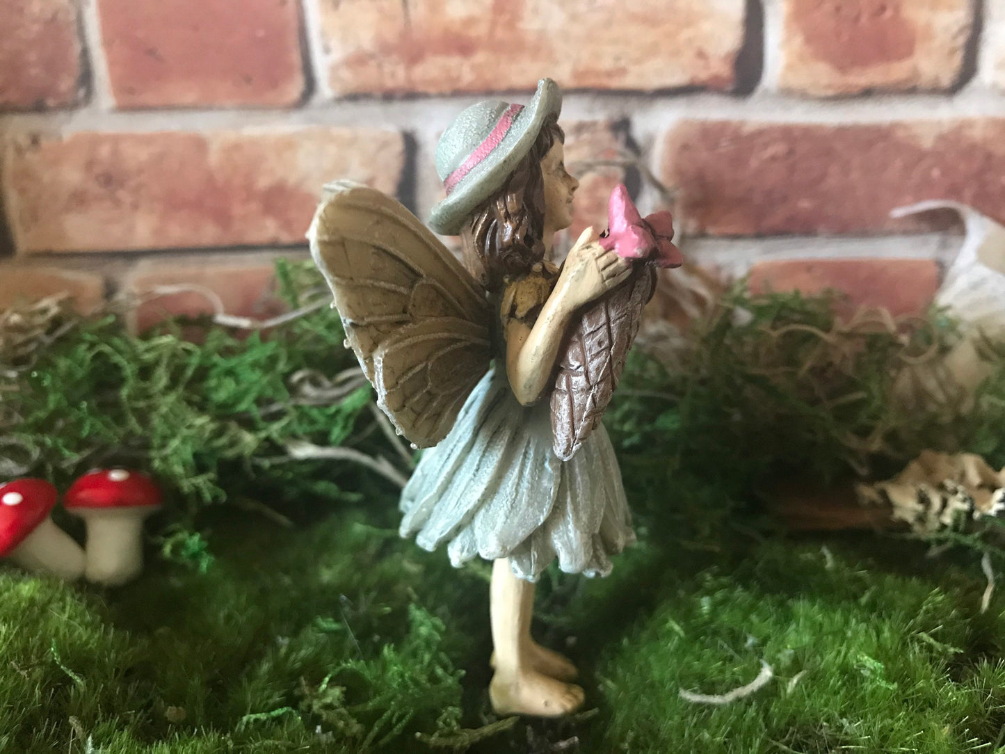 Sweet fairy girl with butterfly and butterfly net