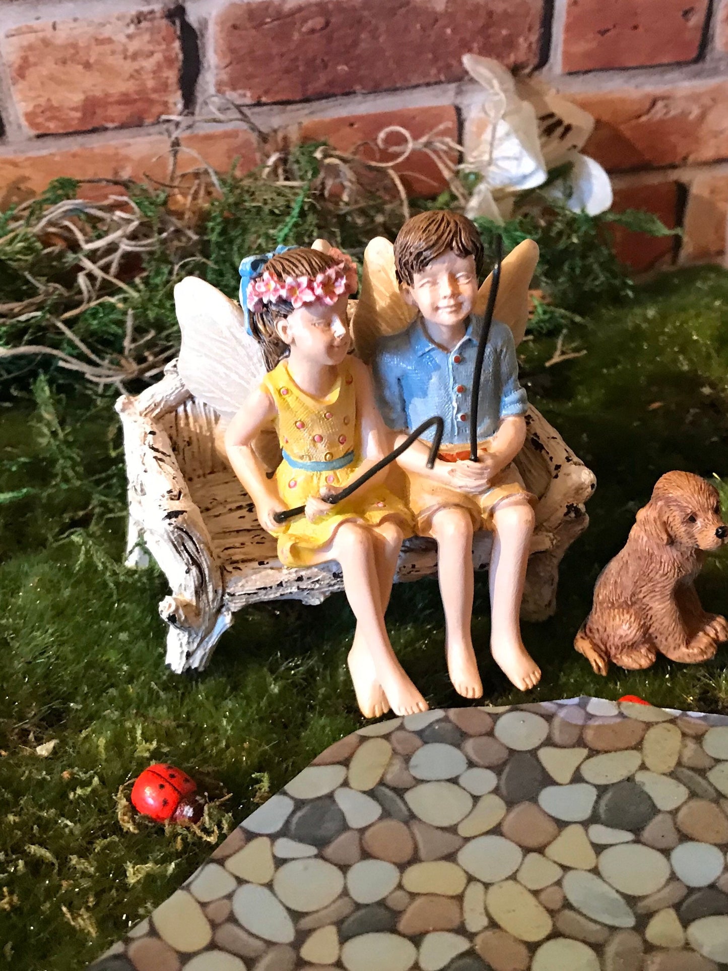 Fairy boy & girl figurine with fishing poles