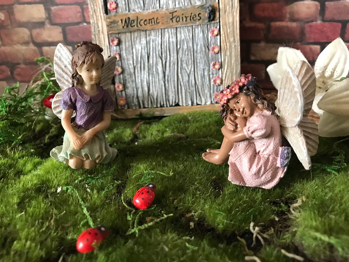 Fairy girl wearing a purple shirt and green skirt