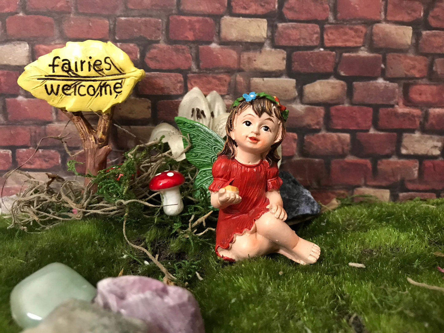 Just look at these sweet faces! Set of 4 miniature fairy garden fairy holding a cute gem