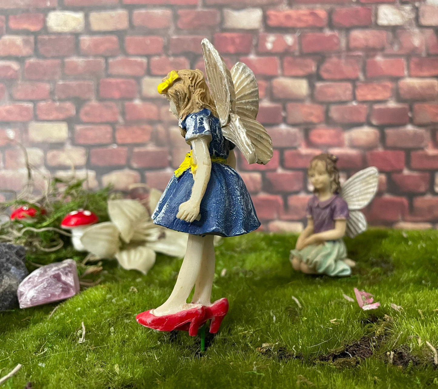 Sweet fairy, red oversized shoes playing dress up