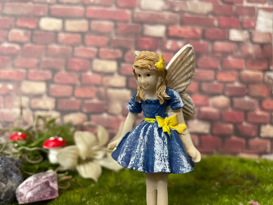 Sweet fairy, red oversized shoes playing dress up