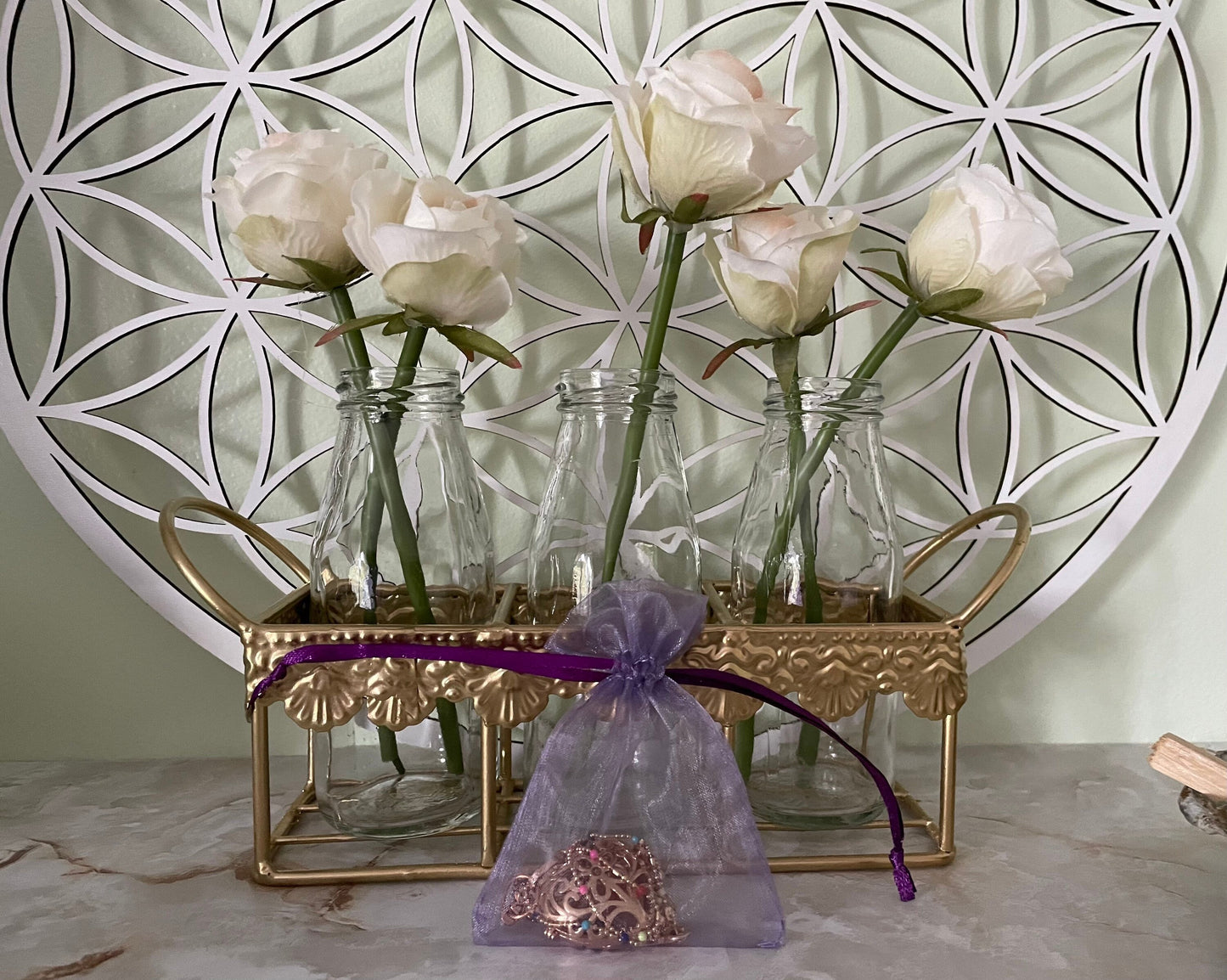 Gold locket filled with crystals on 16+” beaded gold