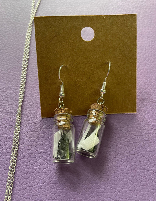 Small bottle earrings and/or necklace filled with a Powerful crystal protection.