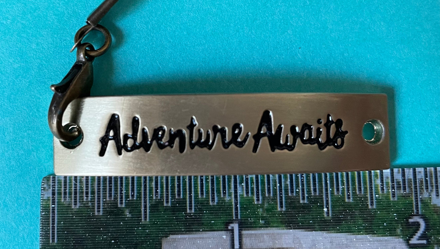 Cute antique gold bracelet with gold and white beads, “Adventure Awaits”!