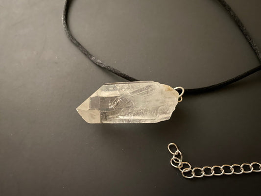 Clear quartz point on 18” black cord