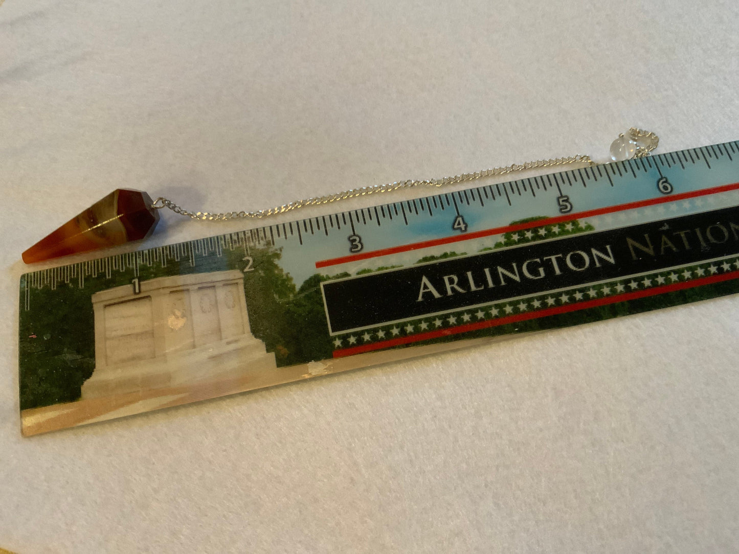 This beautiful Carnelian Pendulum is  1.25” with chain 9”