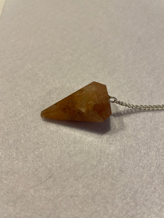 Beautiful Carnelian Pendulum is 1.25” and with the chain it is approximately 9.5”