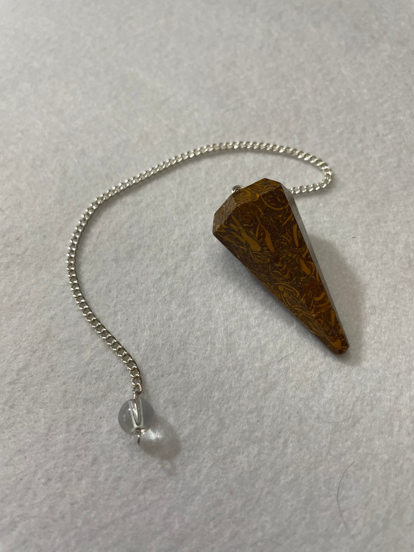 This Mariam Jasper Pendulum is 1.50” and with the chain is 8.25”.