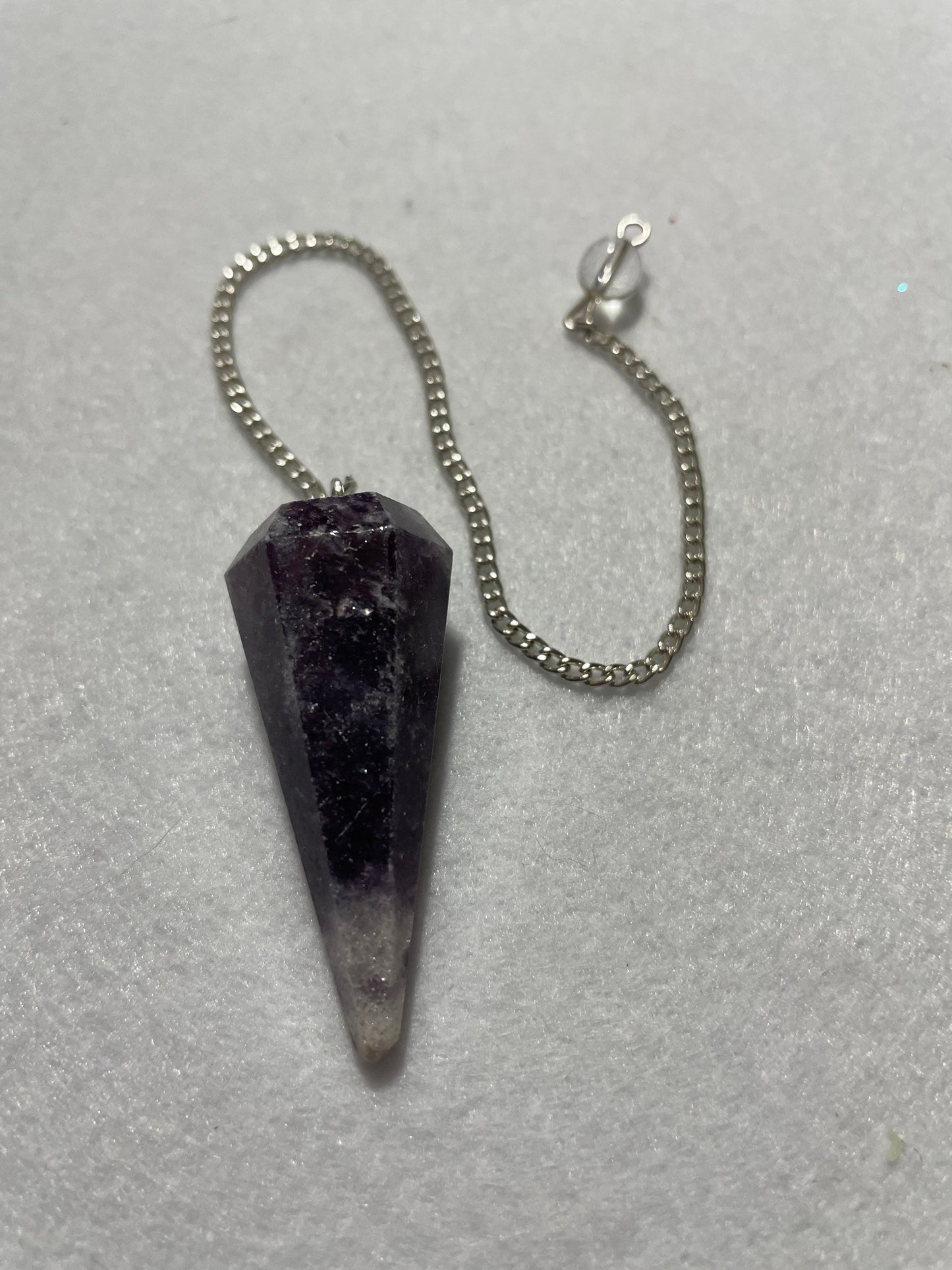 This beautiful Amethyst Pendulum is 1.50” and with chain is 8.5”