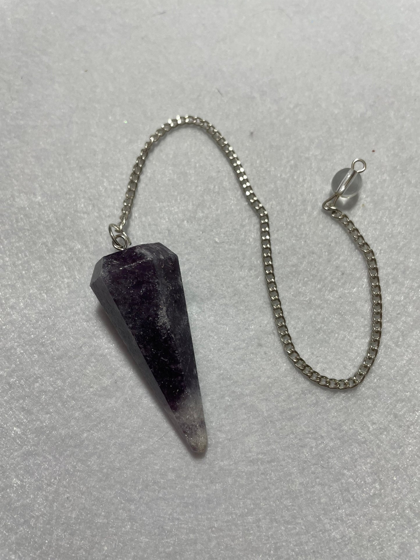 This beautiful Amethyst Pendulum is 1.50” and with chain is 8.5”
