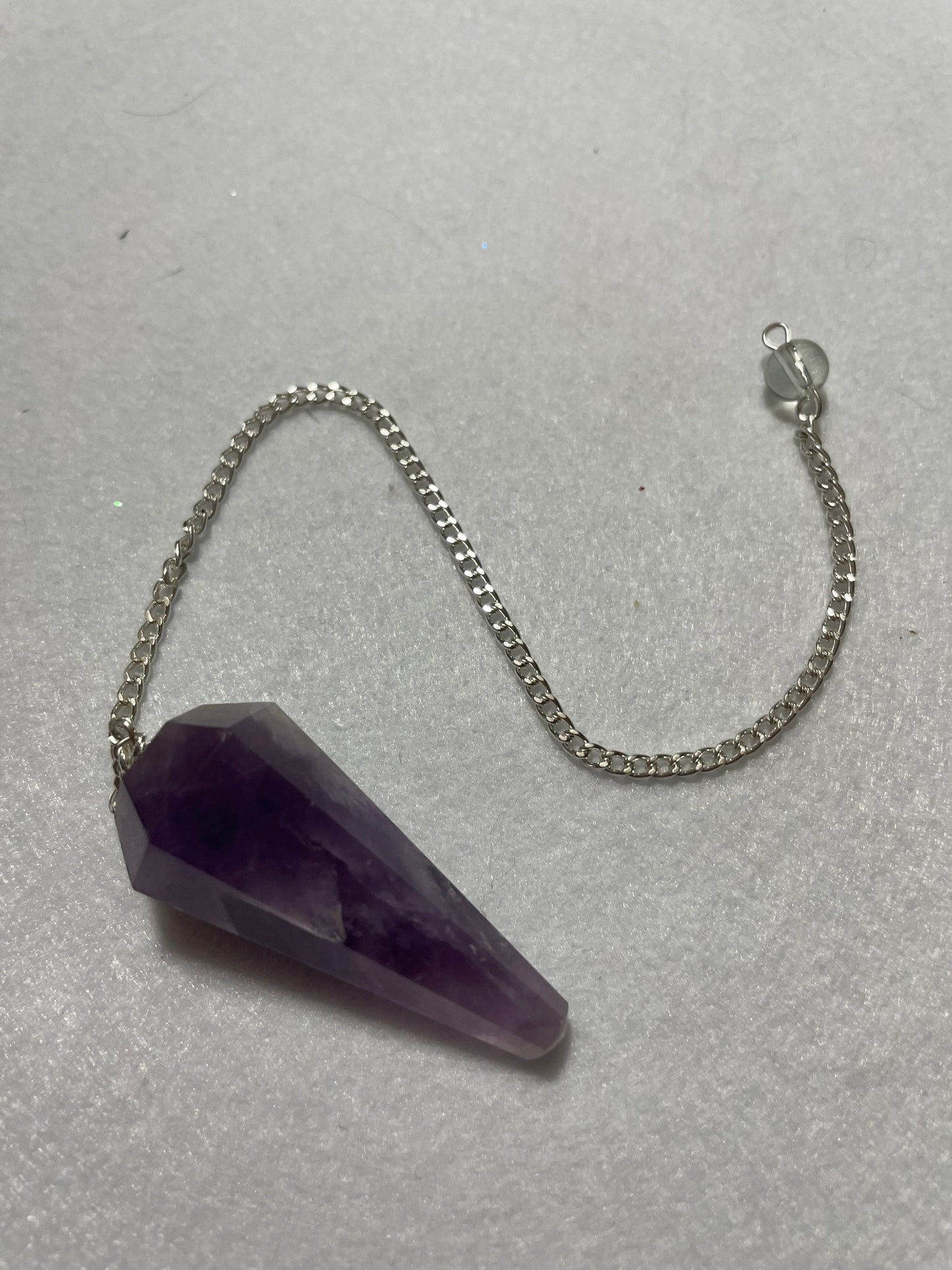 Perfect Amethyst Pendulum is 1.75” and with chain is 9.5”