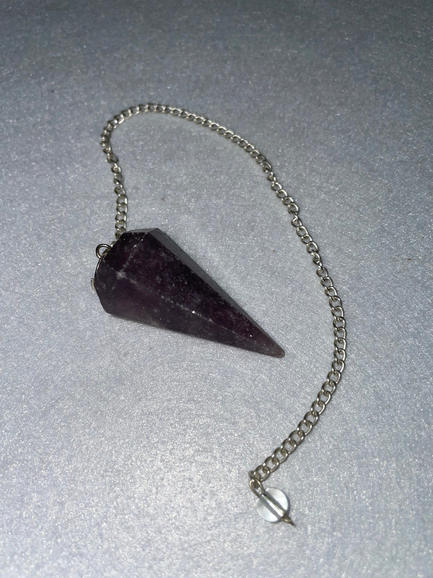 Lovely healing Amethyst Pendulum is 1.65” and with chain is 9.5”.