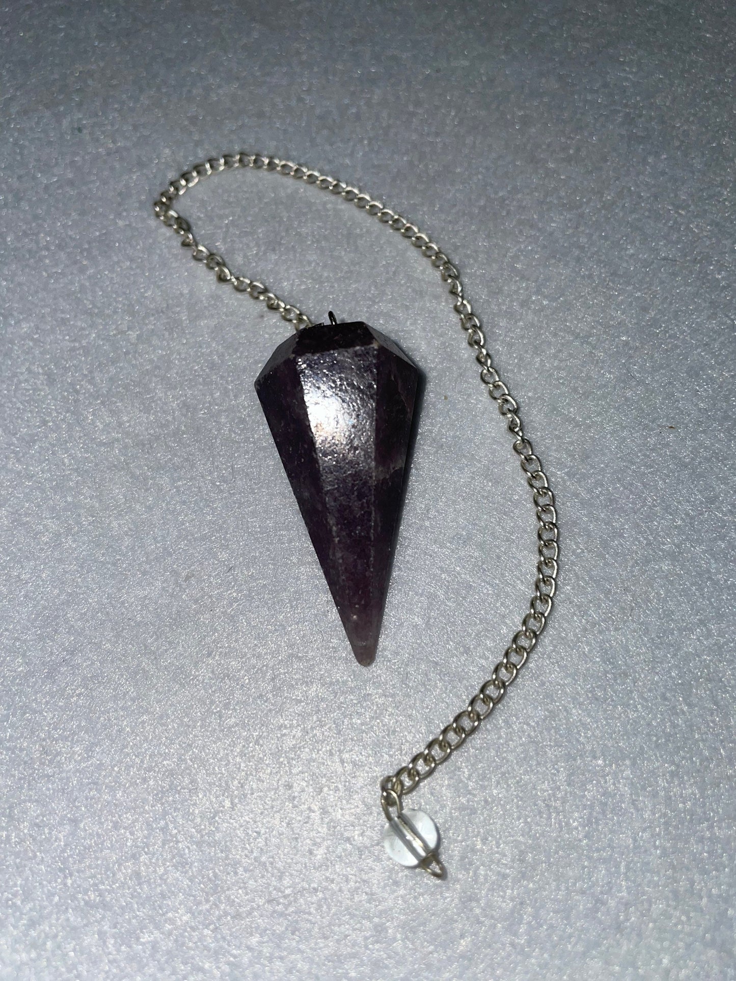 Lovely healing Amethyst Pendulum is 1.65” and with chain is 9.5”.