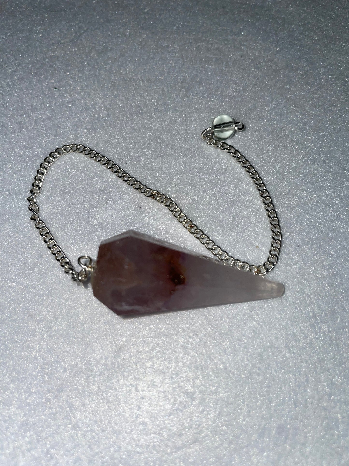 Amethyst Pendulum is 1.75” and with chain is 8.75”